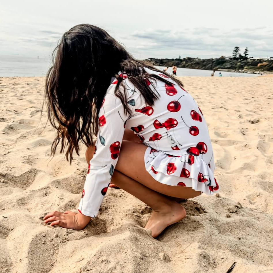 girls white and red cherry swimsuit with change snaps