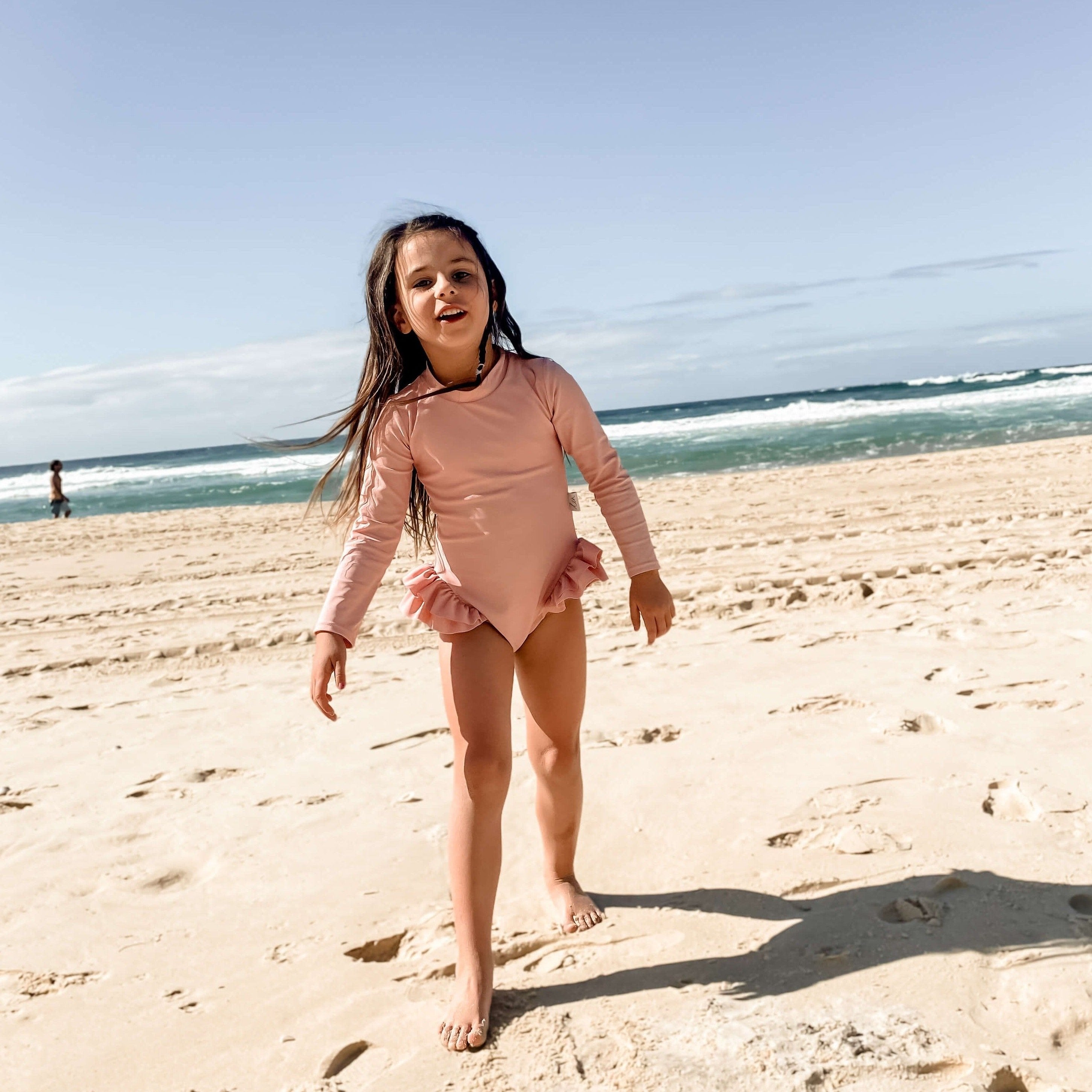 Rose pink swimsuit at beach | Len Swim